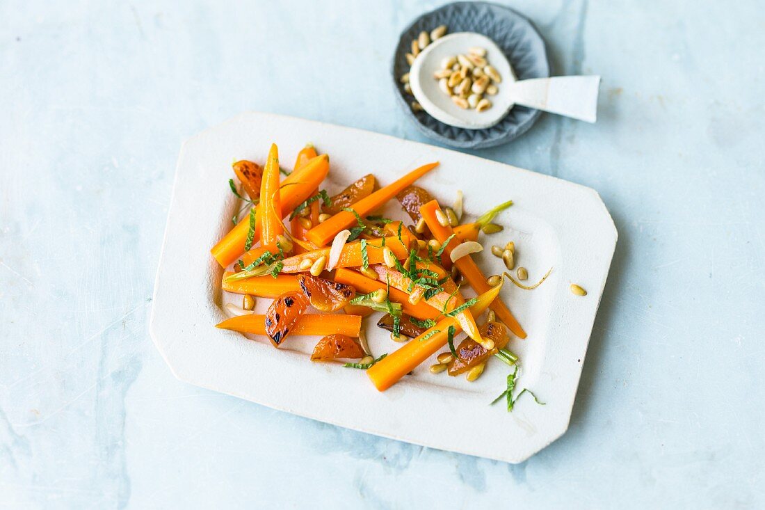 Marinated carrots with pine nuts