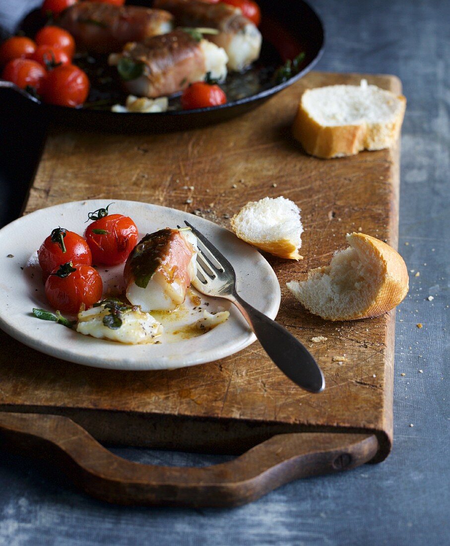 Cod saltimbocca with tomatoes
