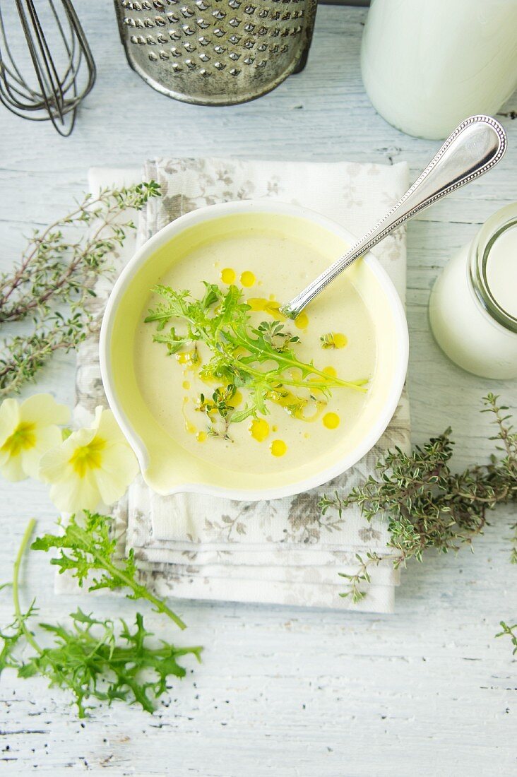 Cream of asparagus soup with rocket