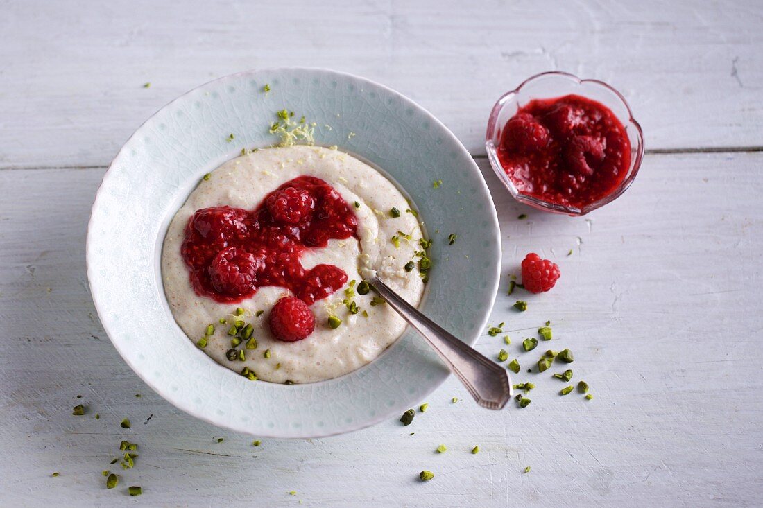 Semolina pudding with raspberries and pistachio nuts