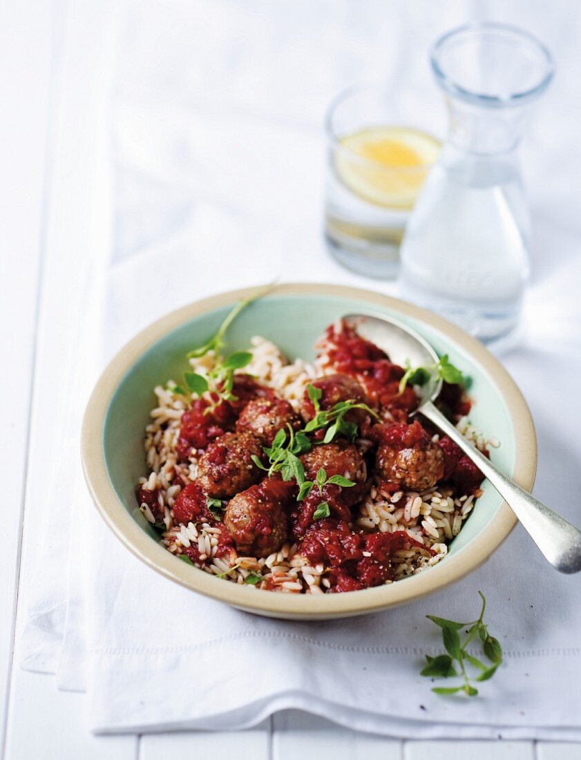 Pasta rice with lamb meatballs and tomato sauce