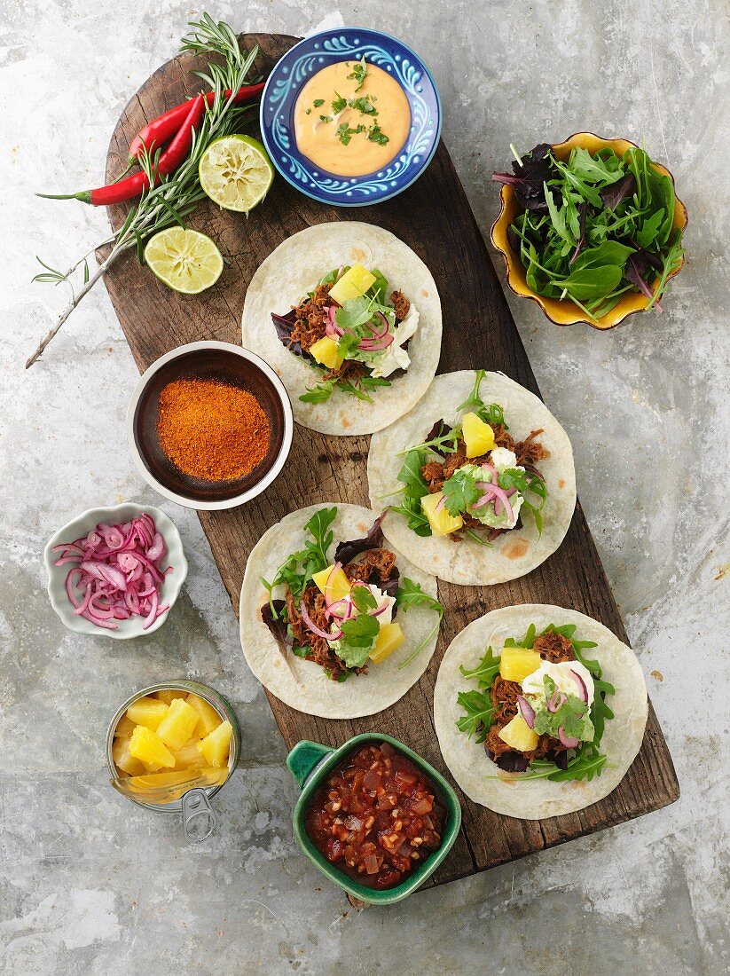 Tortillas and various ingredients (seen from above)