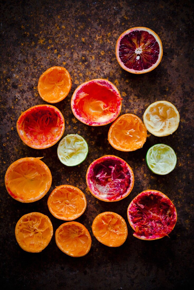 An arrangement of juiced citrus fruits