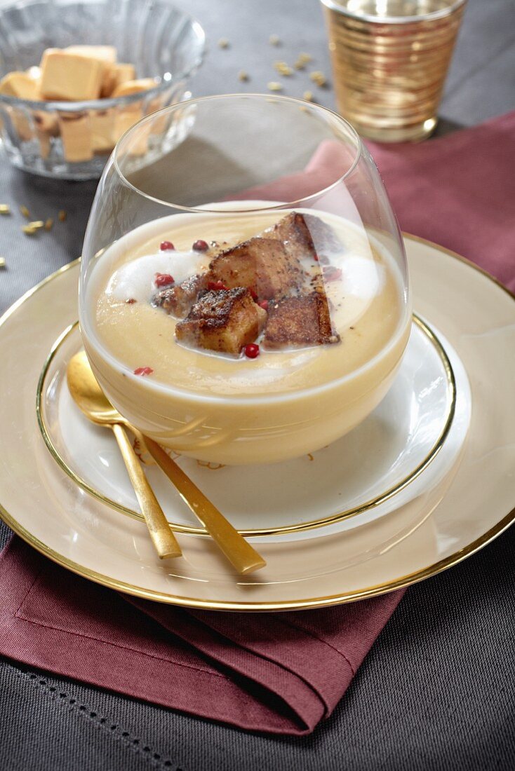 Coconut soup with fried diced goose liver