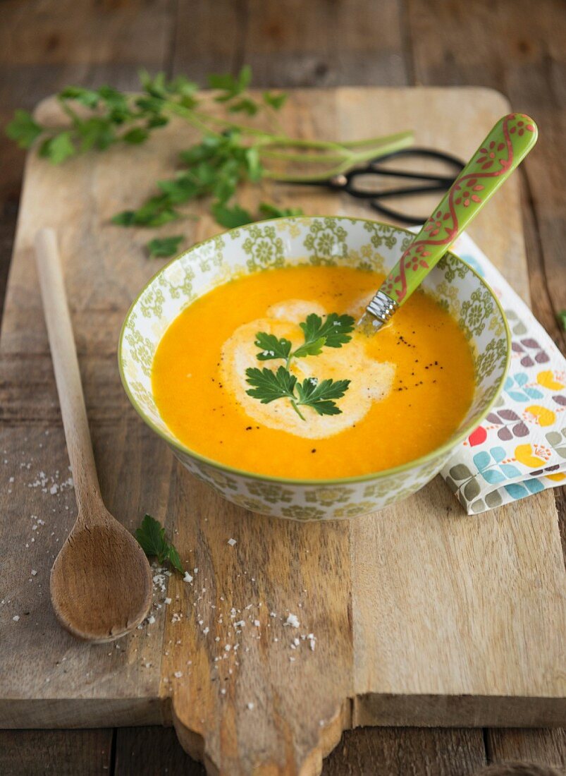Cream of carrot soup with parsley