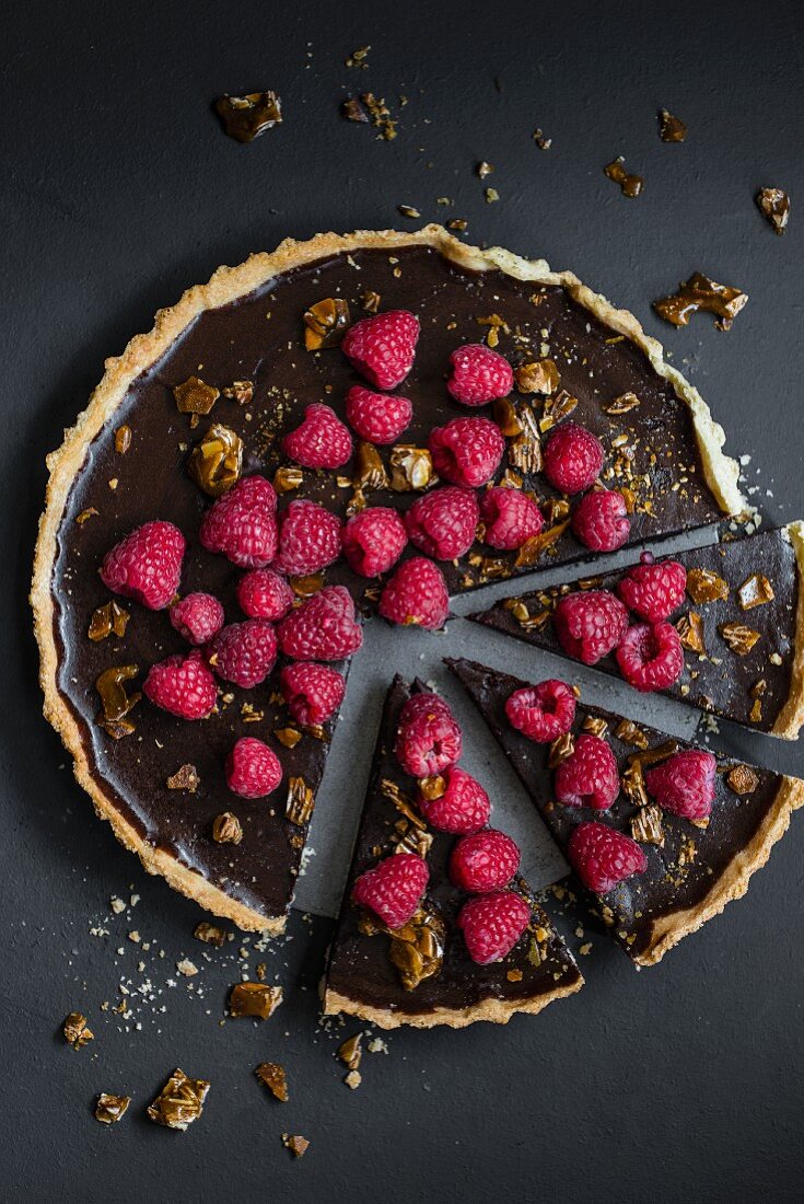 Chocolate tart with raspberries and nuts