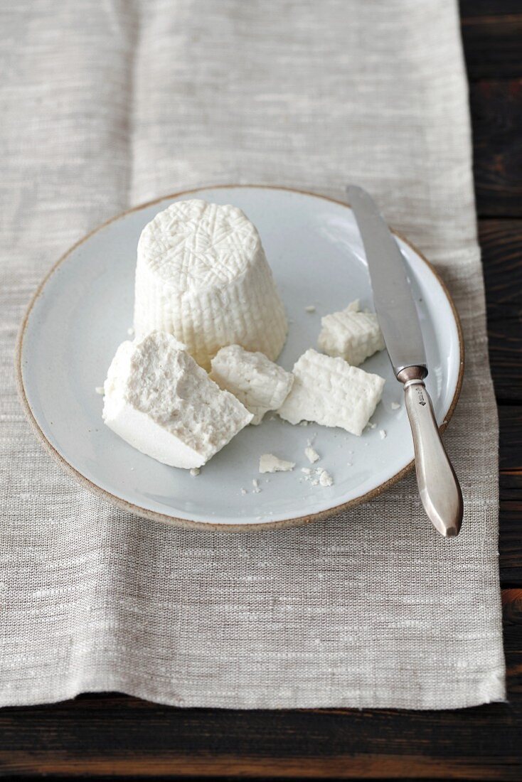 Ricotta stagionata on a plate