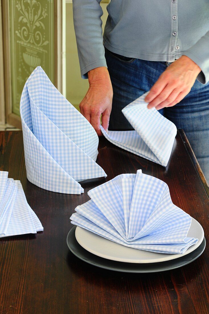 Folding napkins