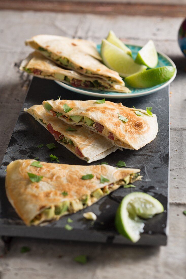 Quesadillas with vegan tortilla cheese substitute and sesame seed paste