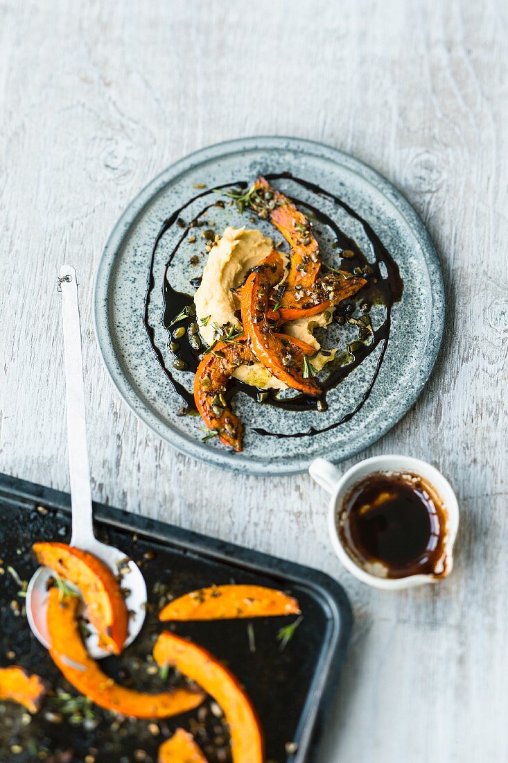 Crispy pumpkin with a lentil and root purée and pumpkin seed oil