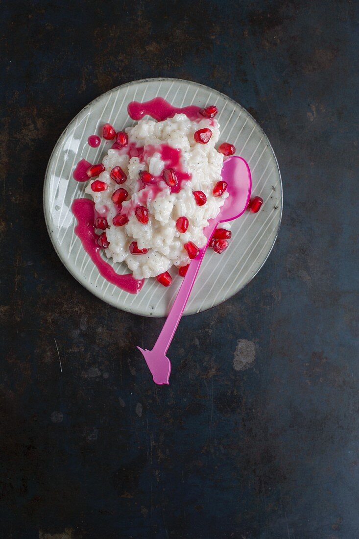 Coconut rice pudding with pomegranate seeds