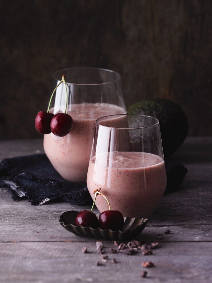Avocado and cherry smoothies with cocoa and almond mousse