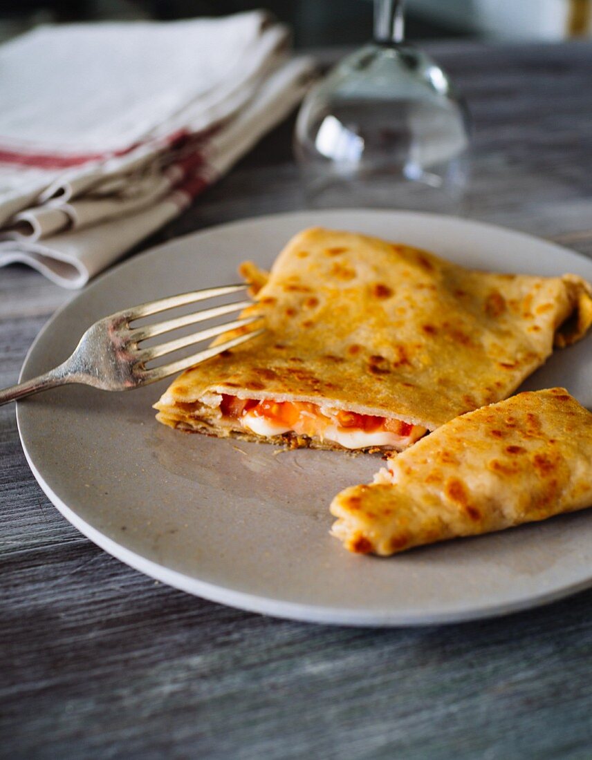 Breton buckwheat crepes filled with tomatoes and cheese