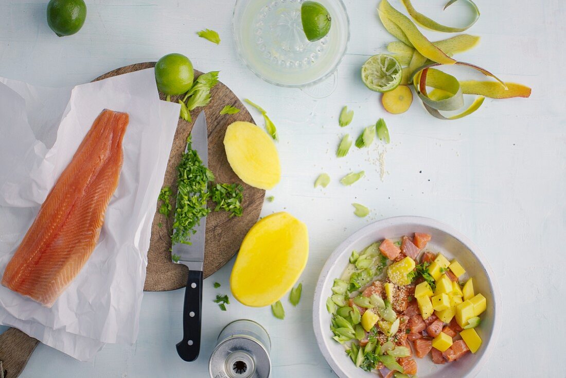 Ingredients for trout ceviche with mango and sesame seeds