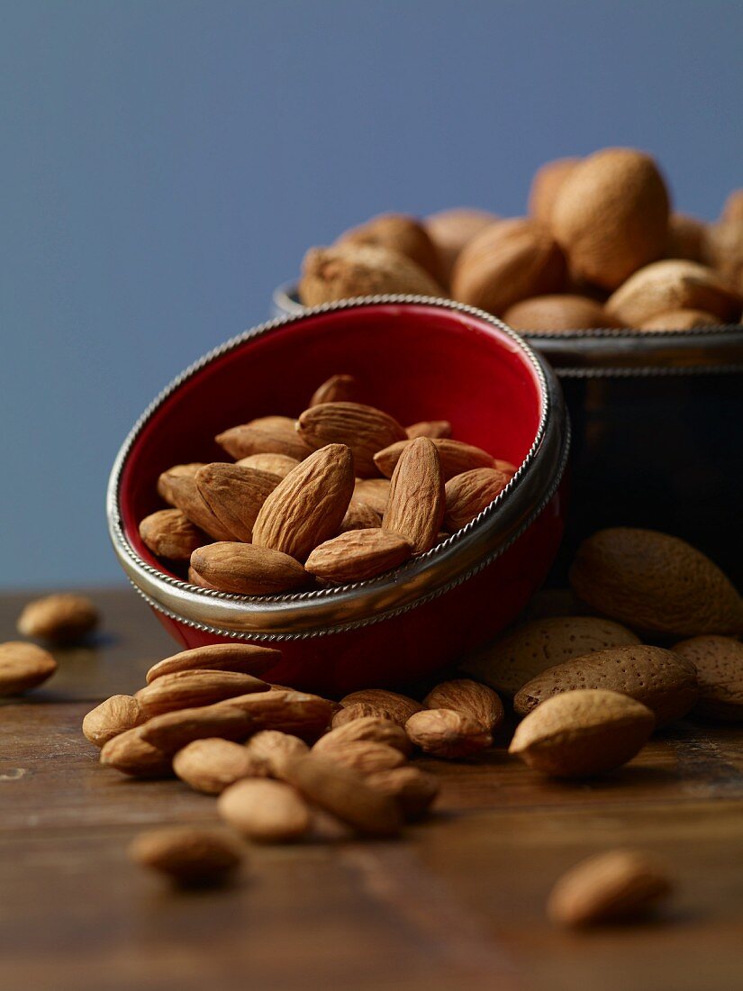 Almonds in a bowl on a wooden table