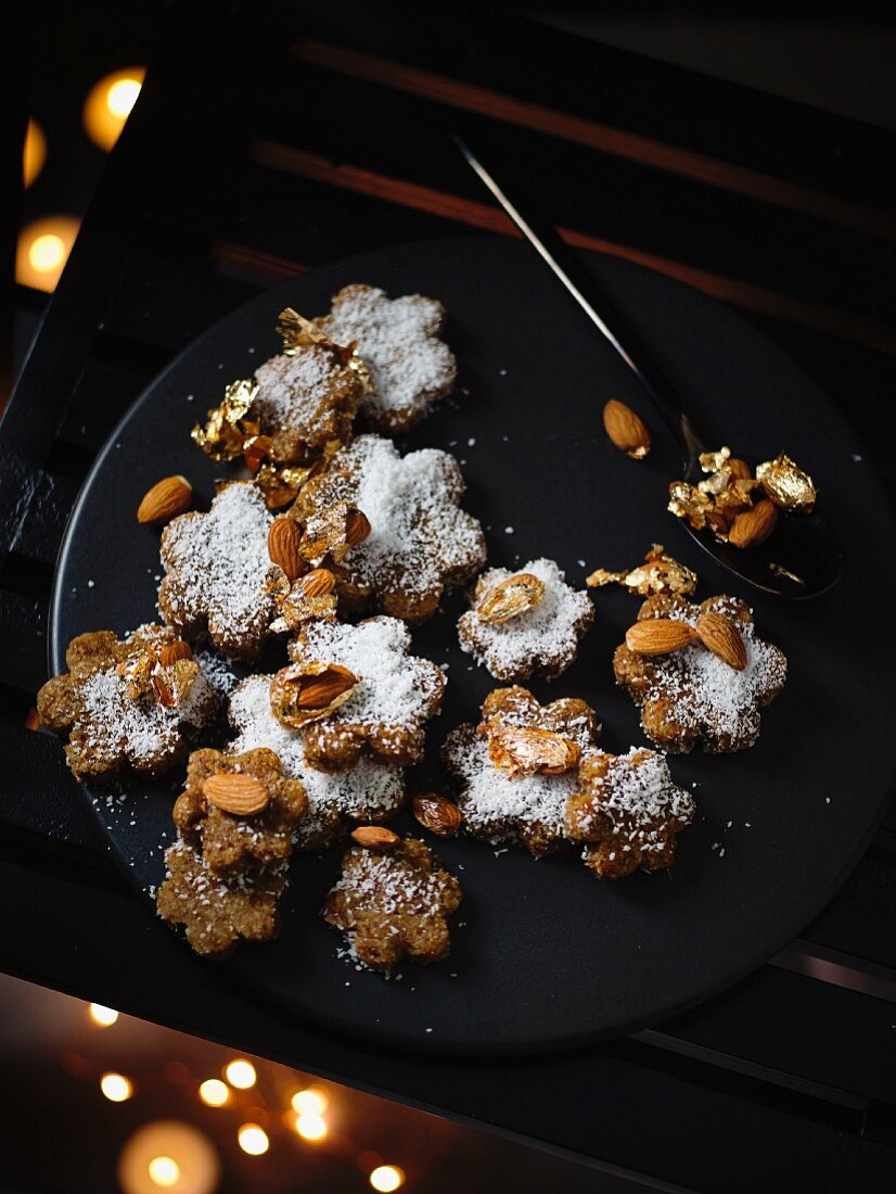 Laddu (Indian cakes) with figs, coconut and golden almonds
