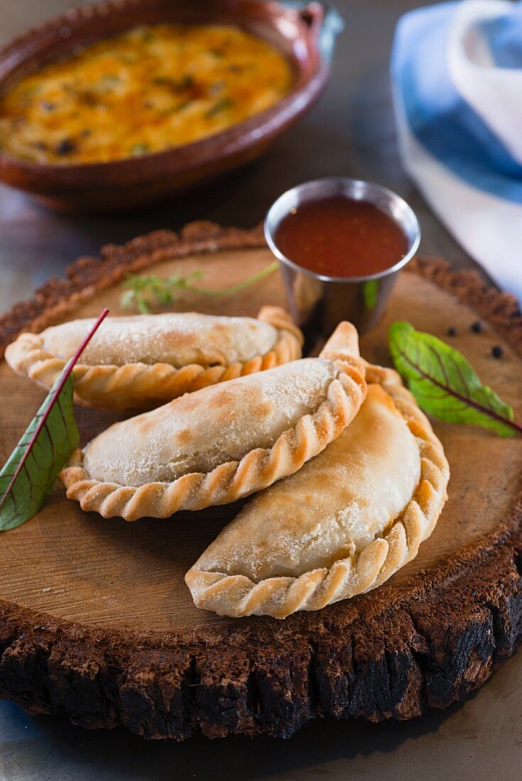 Beef empanadas (South American pasties) served with tomato relish