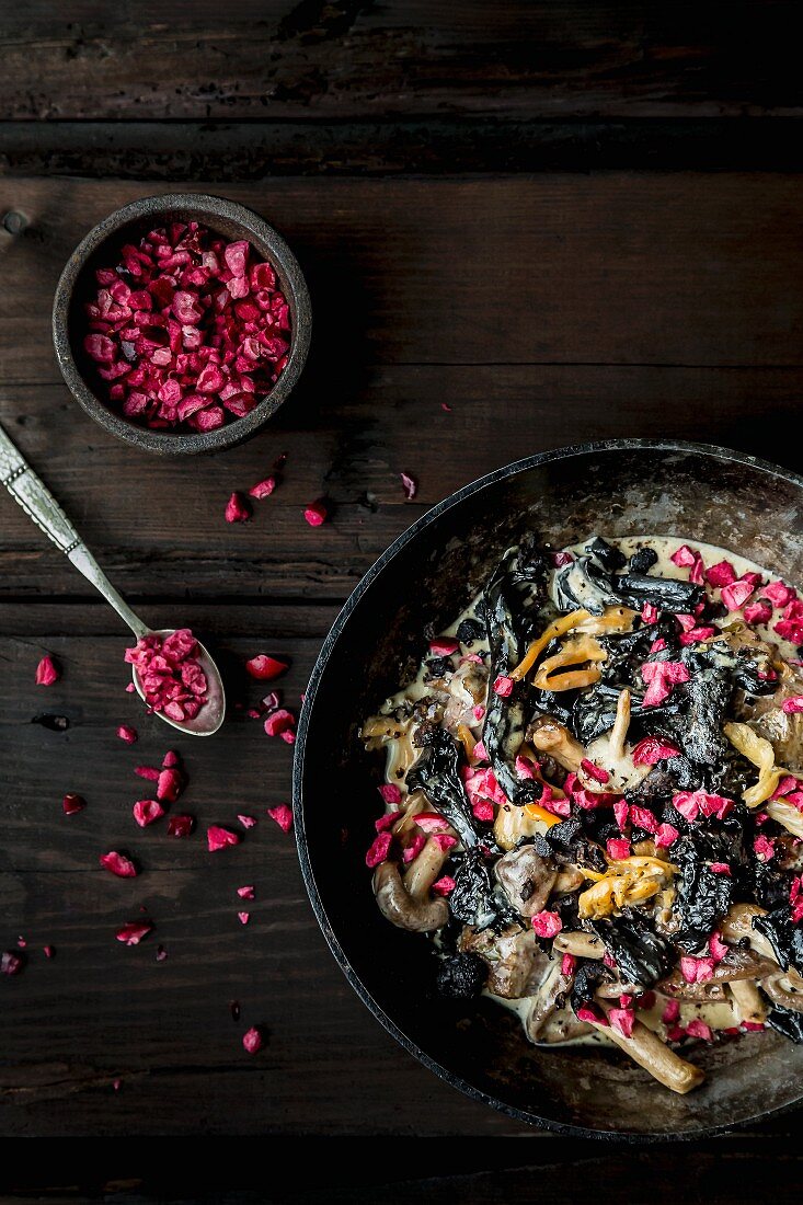 Mixed mushrooms in a creamy sauce with chopped cranberries