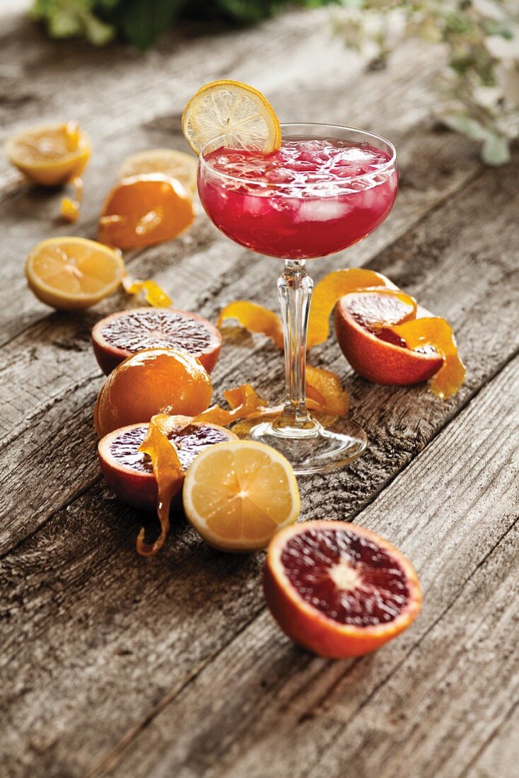 A cocktail with vodka, blood oranges and lemons