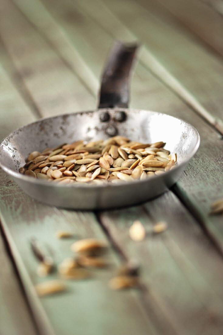 A pan of roasted pumpkin seeds