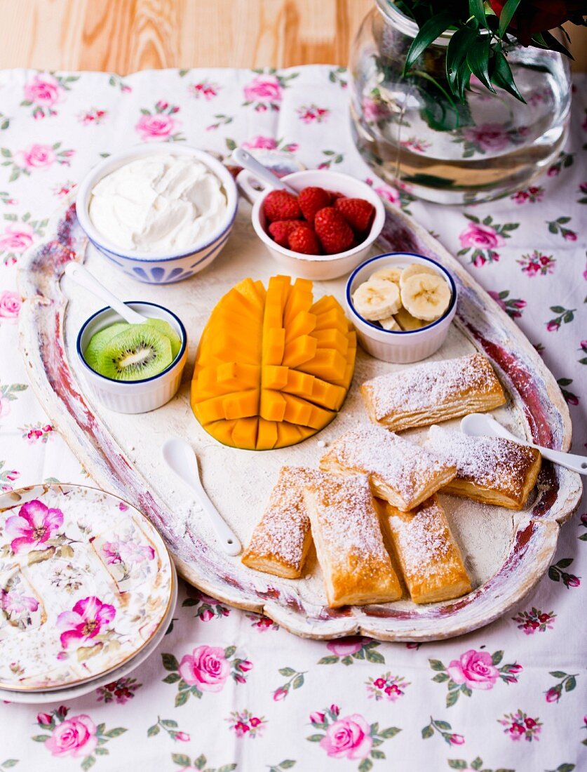 Puff pastries with fruit and whipped cream