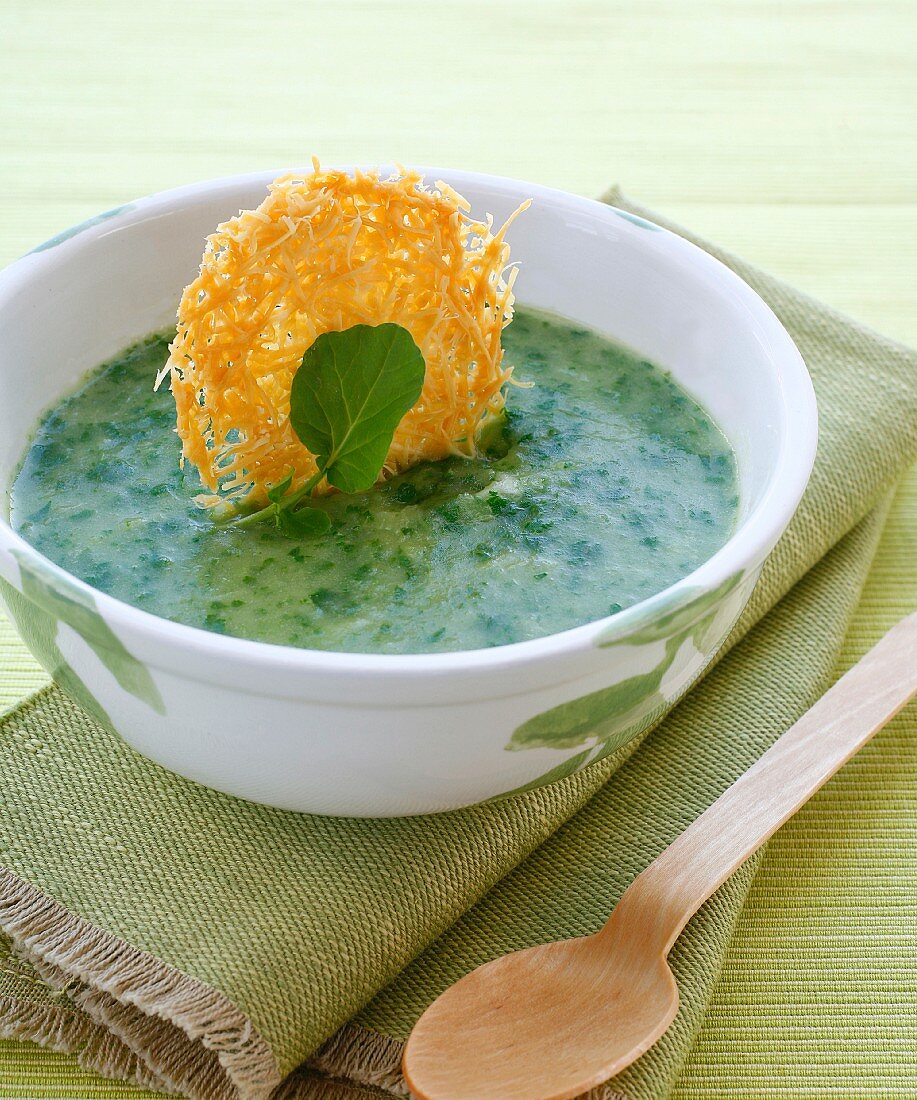 Cold watercress soup with a Parmesan wafer