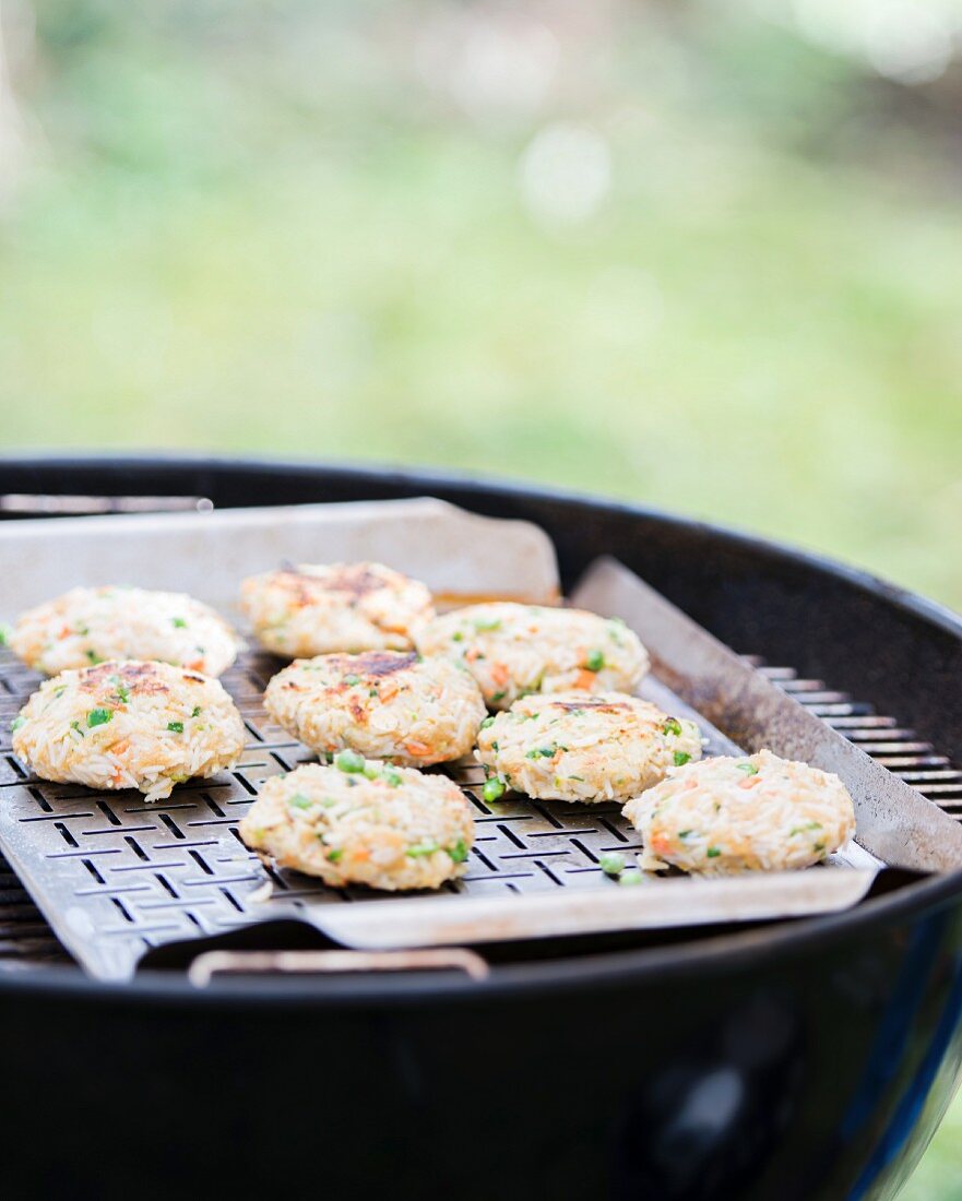Rice fritters on a barbecue