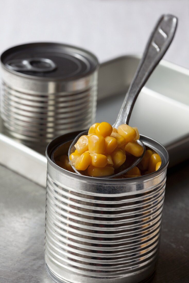 Tinned sweetcorn on a spoon