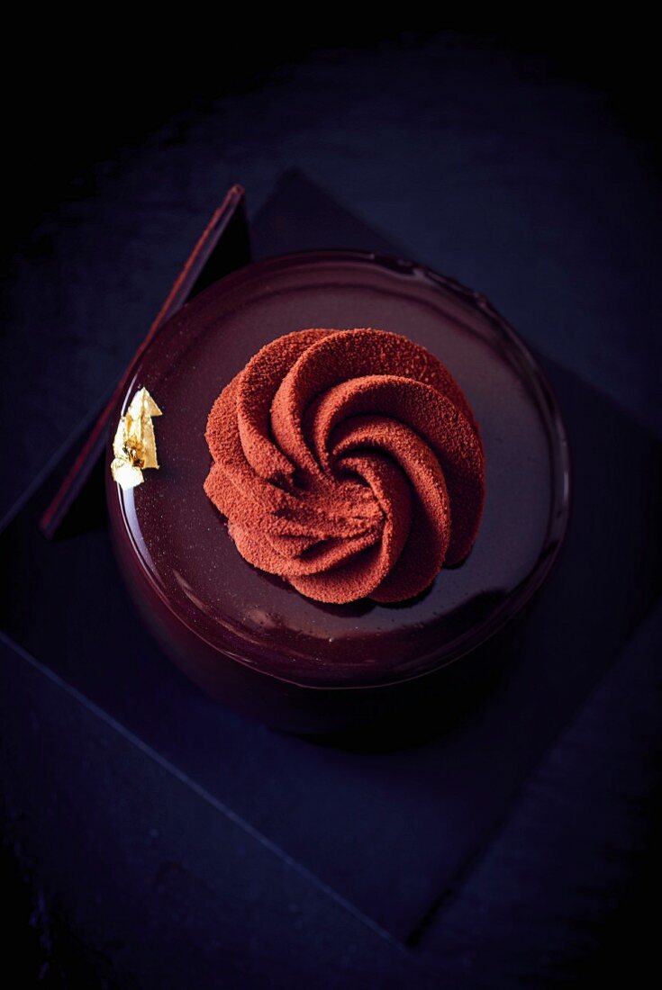 A chocolate cake with cocoa cream