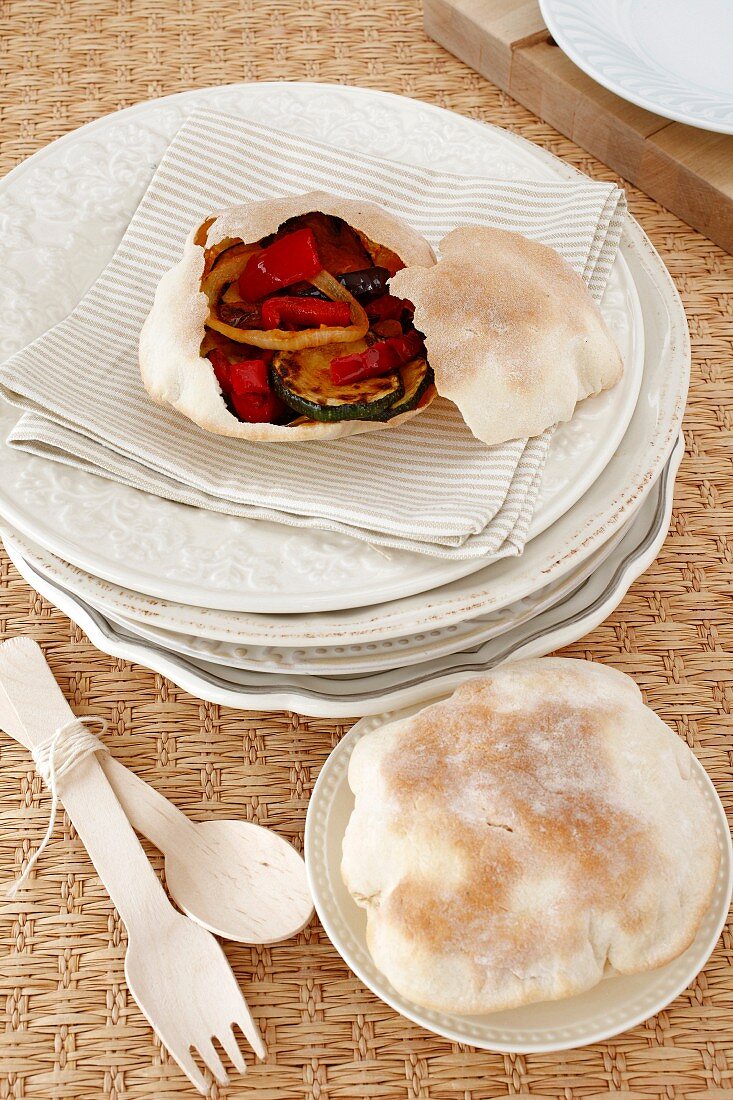 A bread roll filled with oven-baked ratatouille