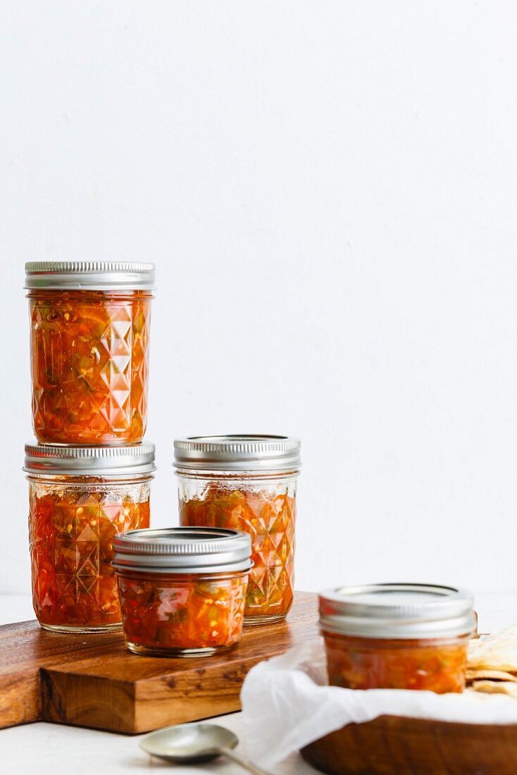 Tomato salsa in screw-top jars