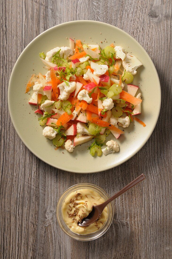 Cauliflower salad with apple, celery and carrots
