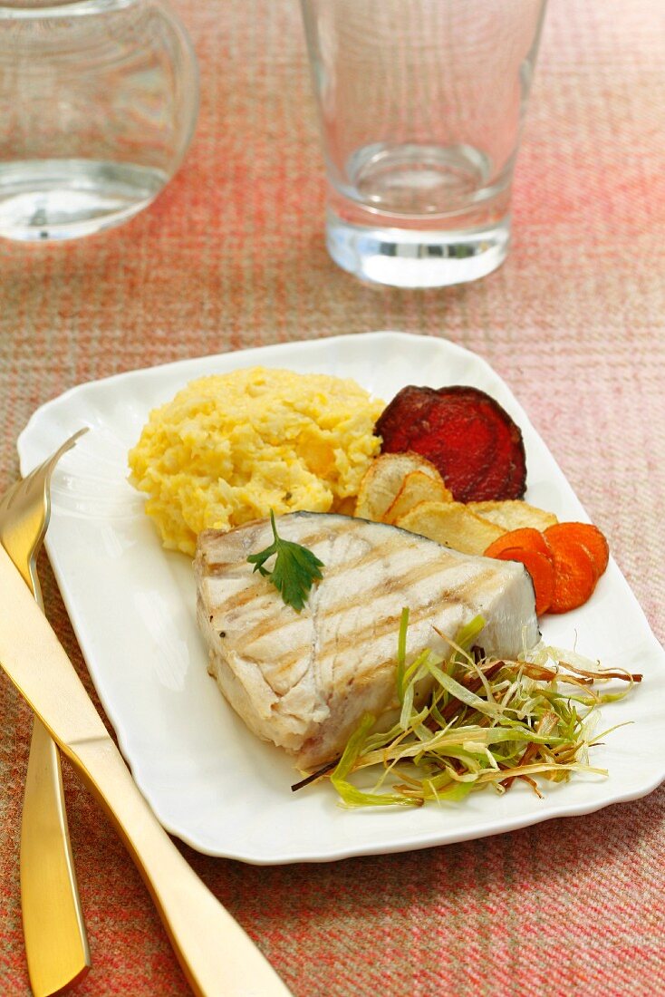 Swordfish with cauliflower purée and vegetable crisps