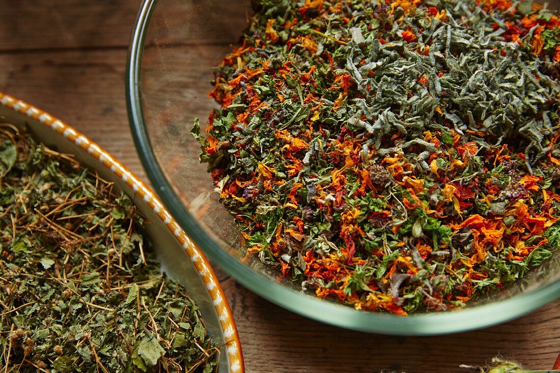 Bowls of dried salad herbs
