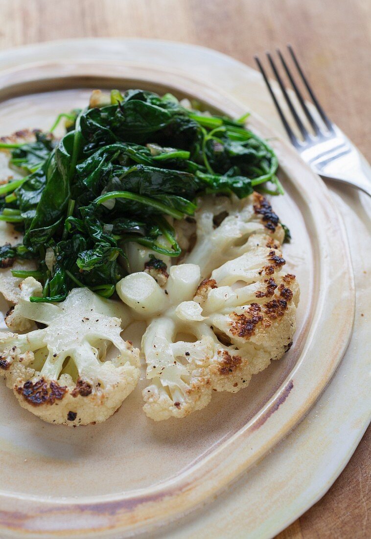 Cauliflower steak with spinach