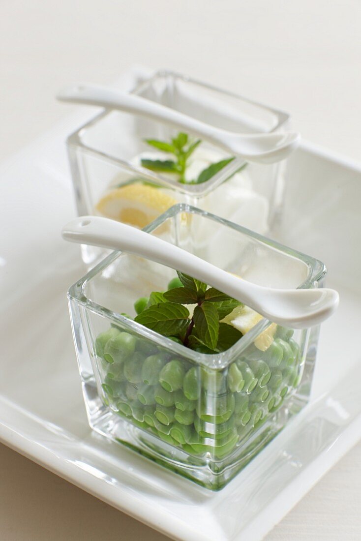 Peas with mint in glass bowls