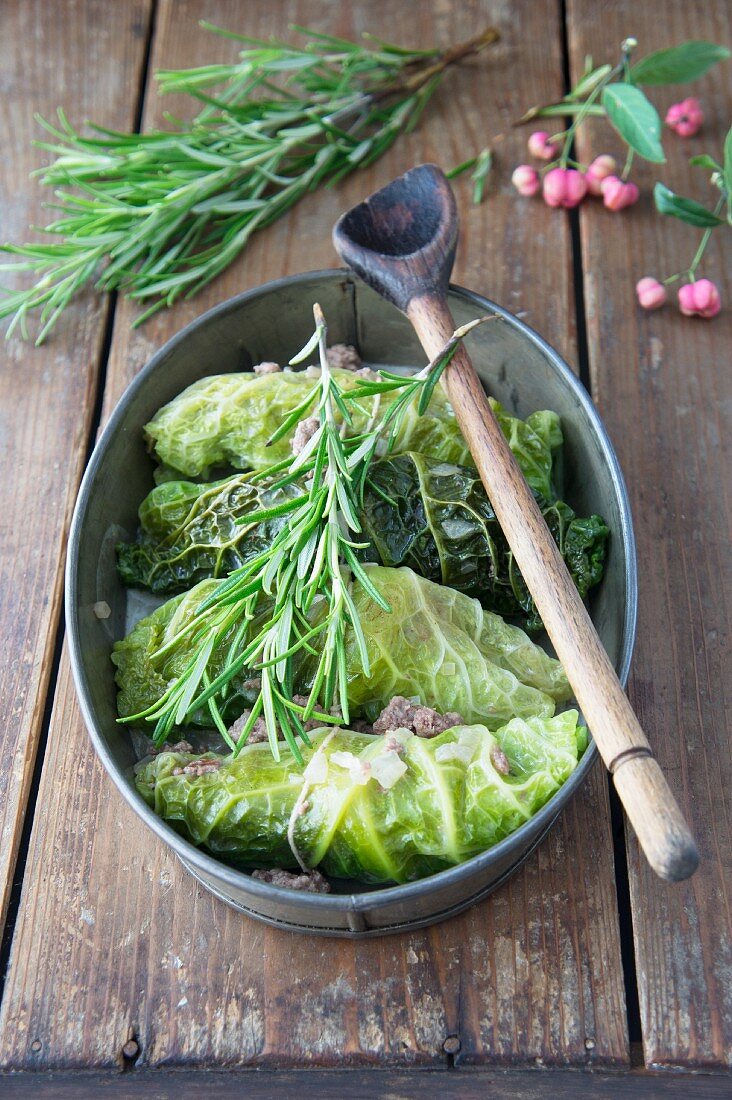 Savoy cabbage roulades with a quince and minced meat filling