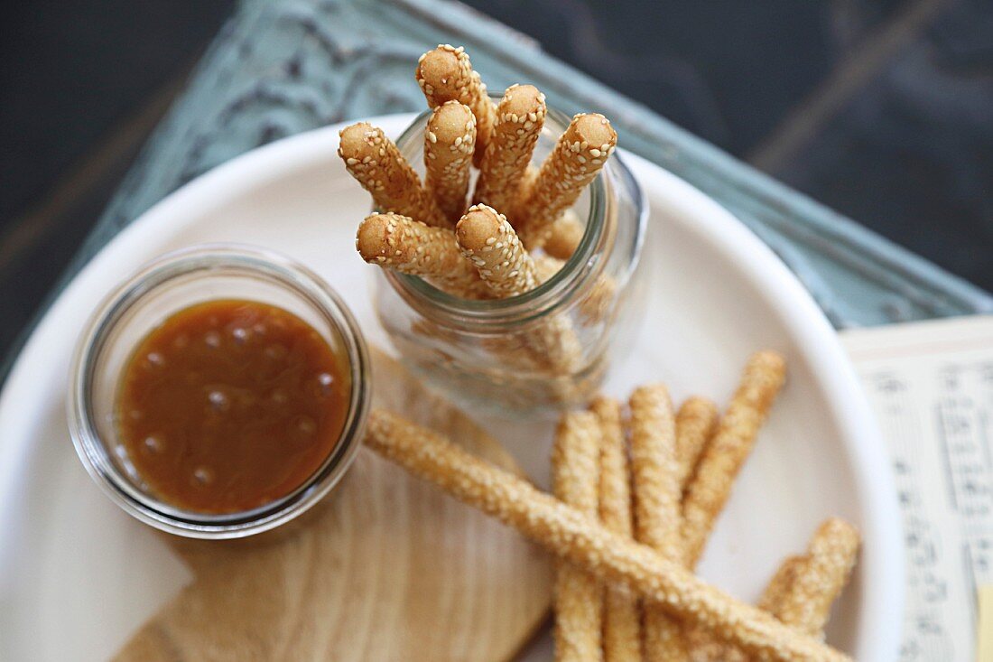Sesame grissini with a salted caramel dip