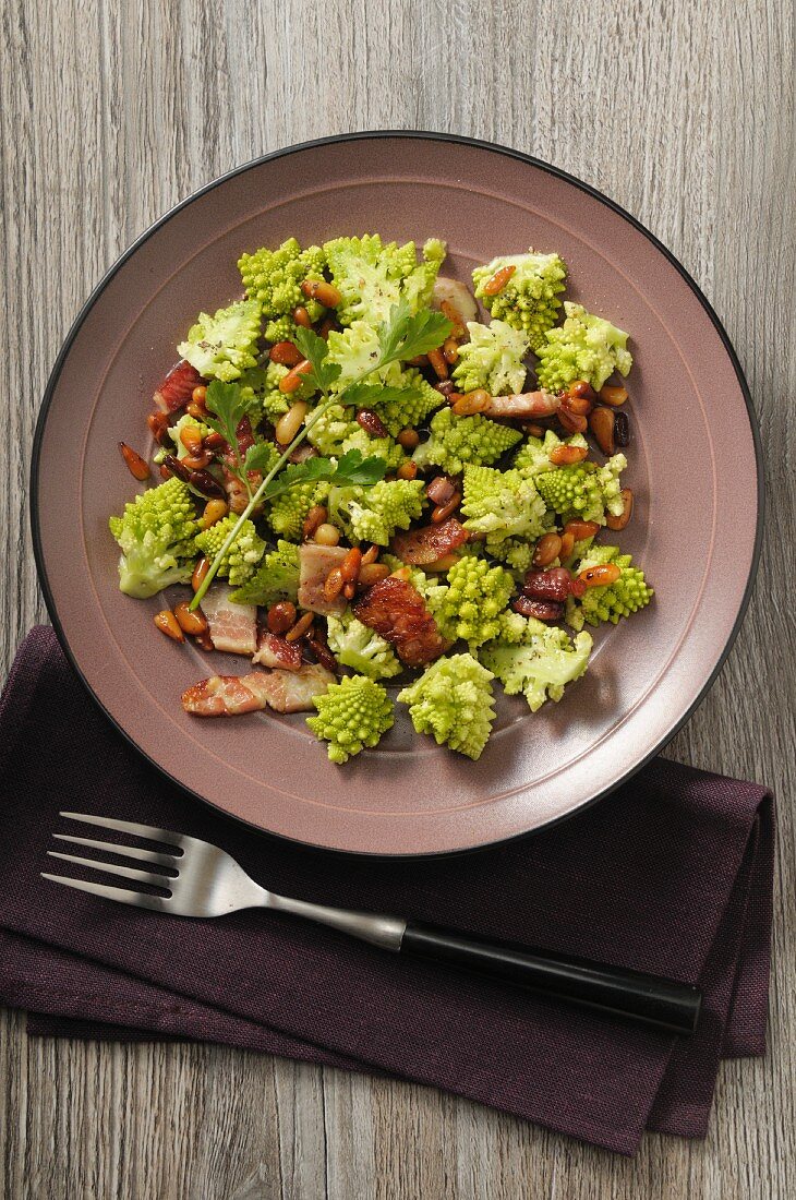 Romanesco broccoli with bacon, pine nuts and coriander vinaigrette