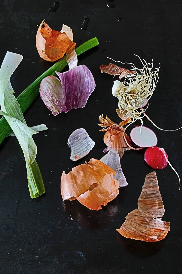 An arrangement of onions and radishes