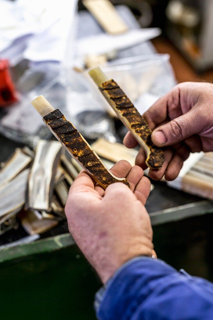 Handles for knives being checked in an Italian knife factory