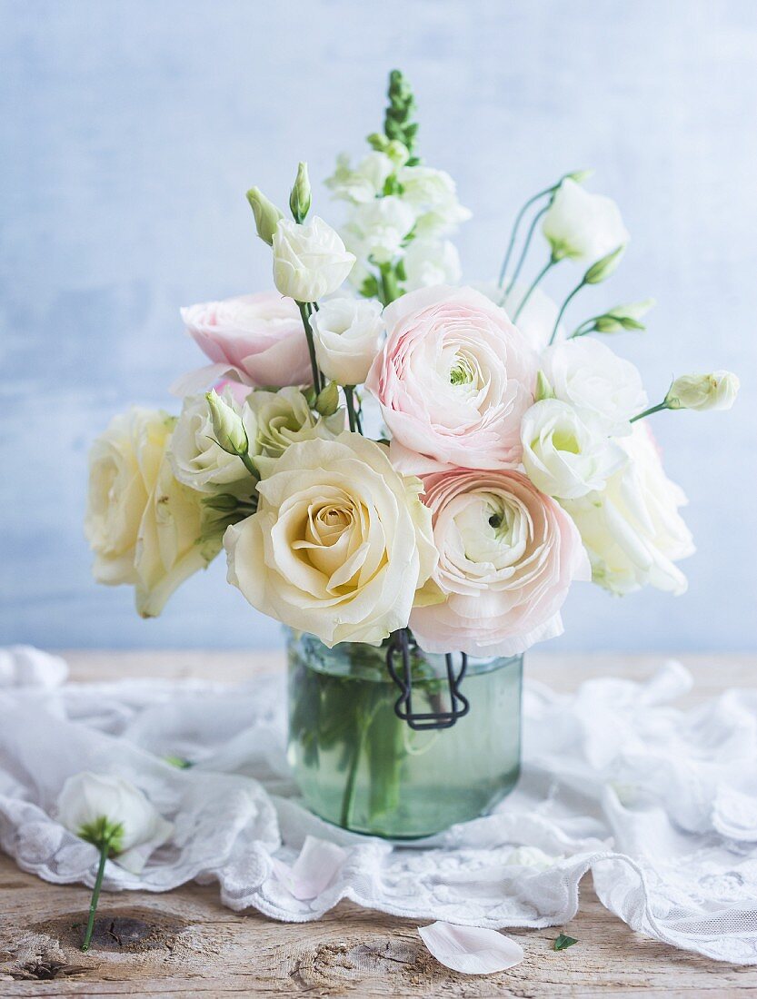 Pastel bouquet in old swing-top jar