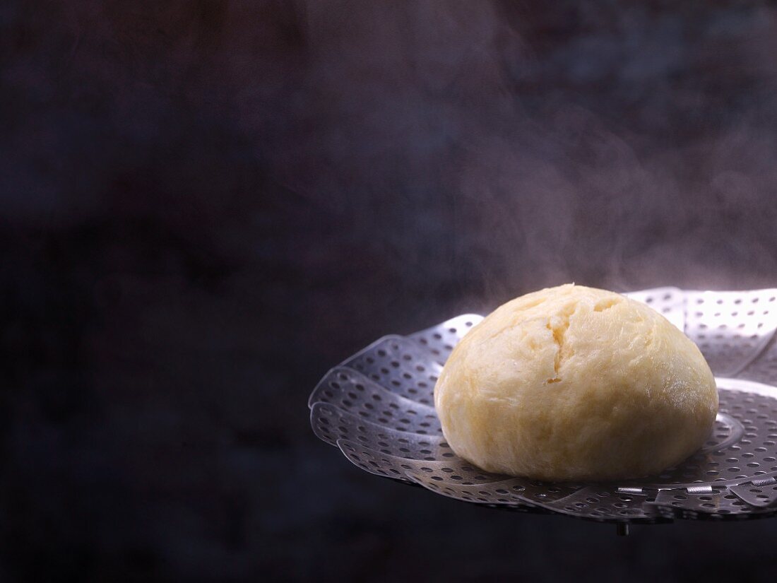 Germknödel (steamed yeast dumpling) being made