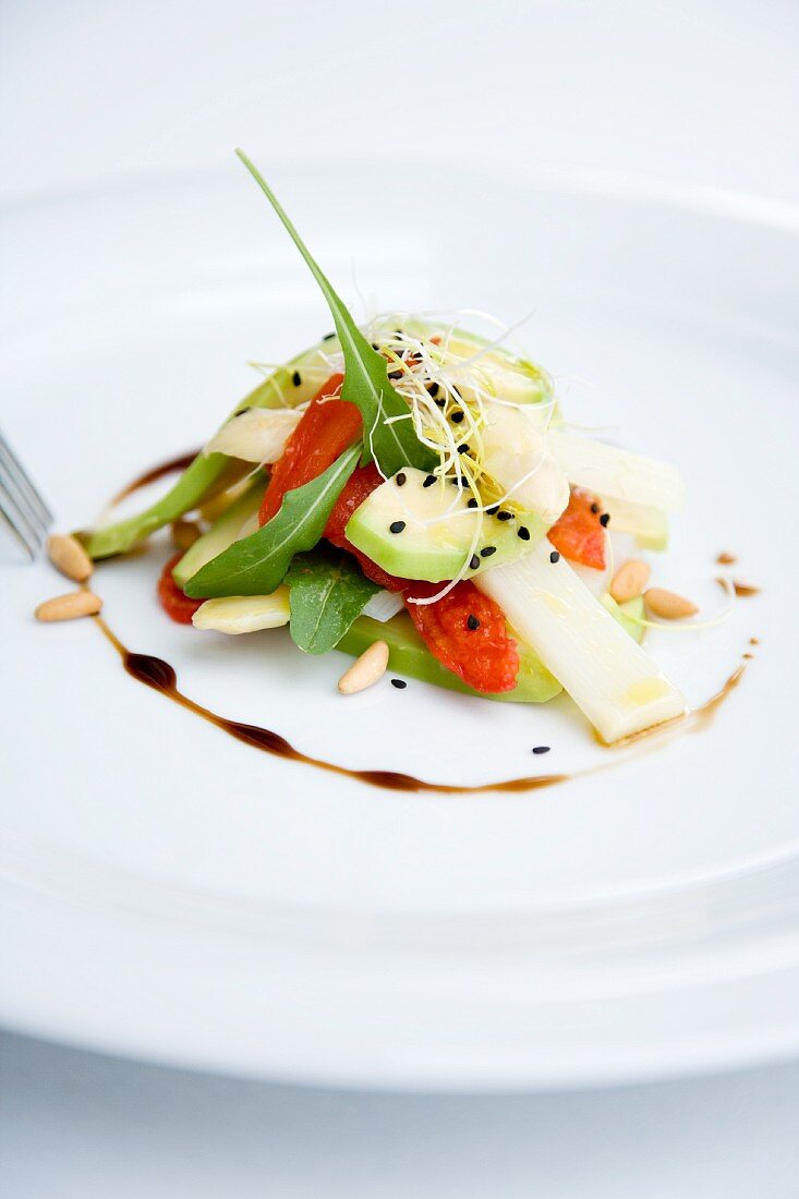 White asparagus salad with avocado and oven-roasted tomatoes