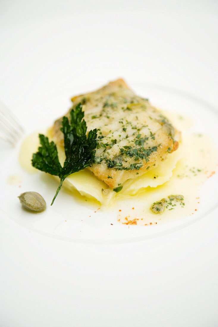 Fried thornback ray with mashed potatoes and parsley and caper butter