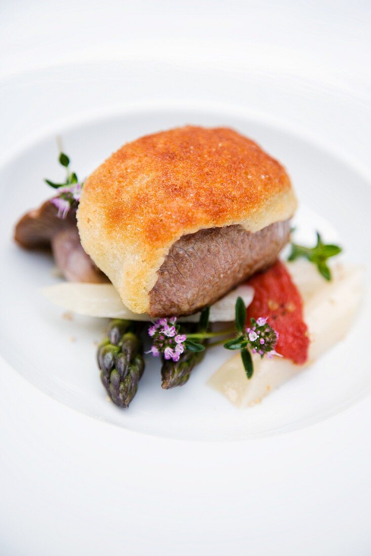 Saddle of lamb in a Parmesan crust, fresh wild mushrooms and Provençal vegetables