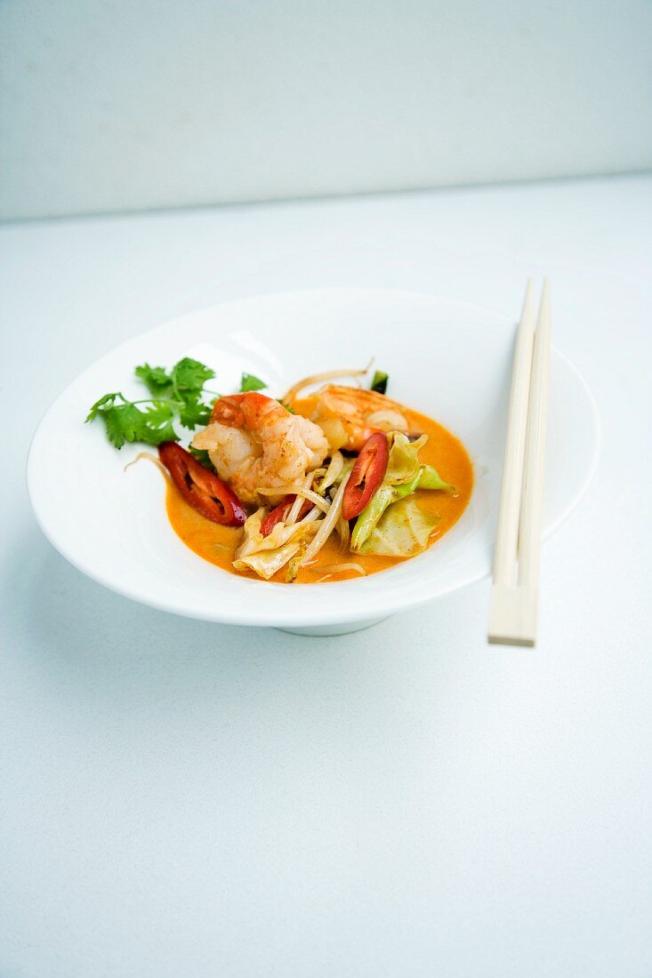 Coconut ramen with prawns and oriental vegetables