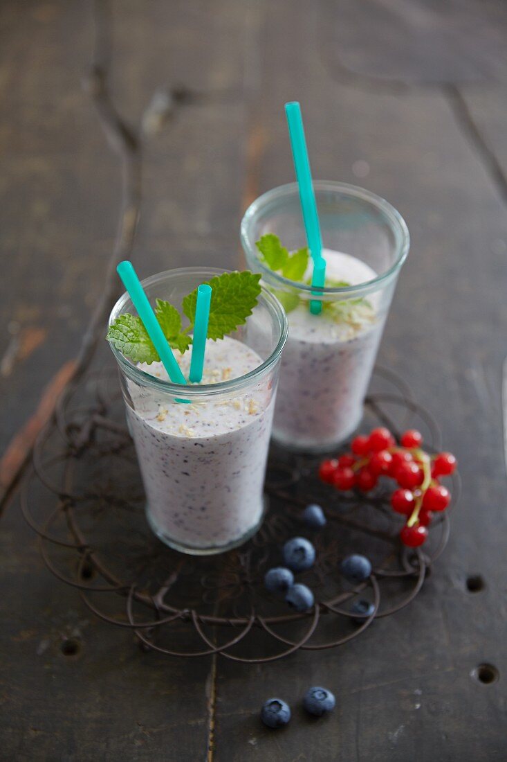 Berry smoothies with blueberries and redcurrants