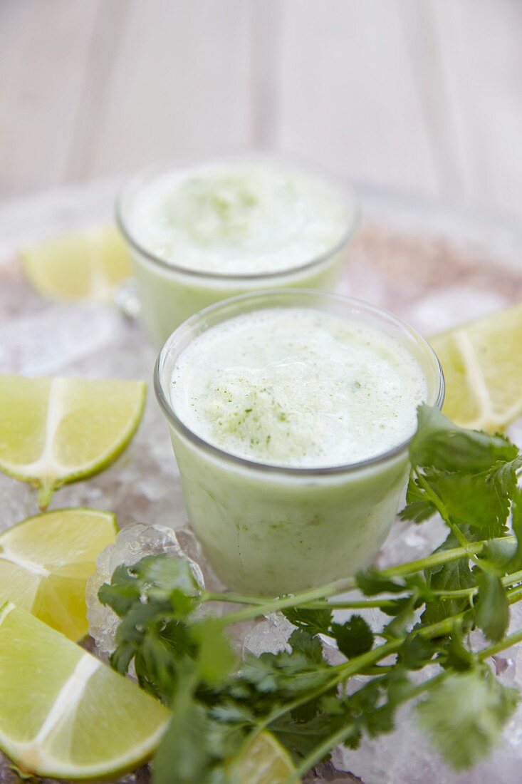 Yoghurt smoothies with herbs and limes