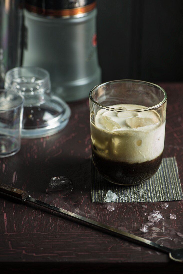 A White Russian cocktail with ice